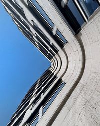 Low angle view of building against clear blue sky