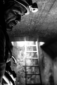 Closeup of a man working in a sewer