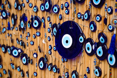 Full frame shot of clothes hanging on wood