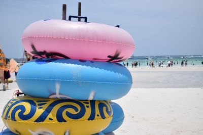 Stack of inflatable rings at beach