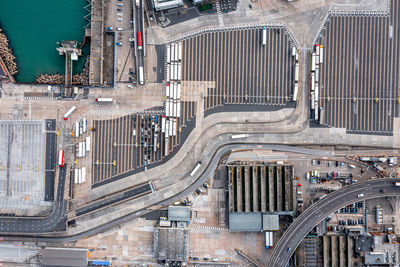 Aerial view of harbor and trucks parked along side each other in dover, uk.