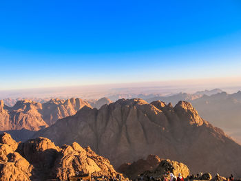 Panoramic view of mountain range against clear sky
