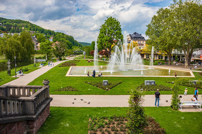 Fountain in park against sky