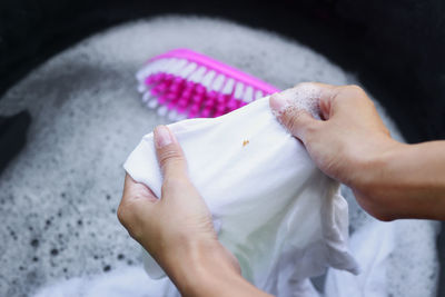 High angle view of man working on paper