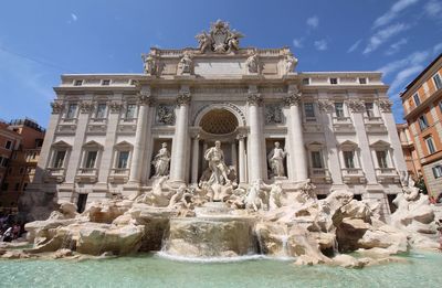 Fountain in front of historical building