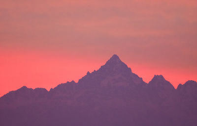 Scenic view of mountains against sky during sunset