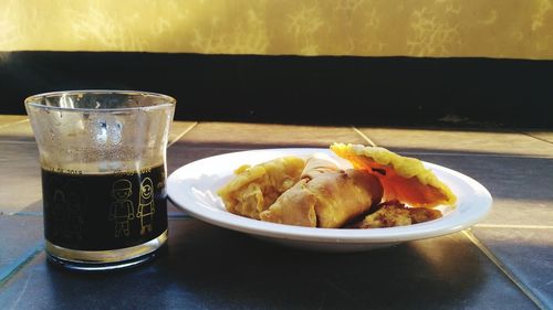 Close-up of food served on table