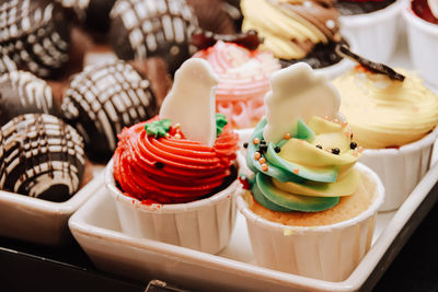 High angle view of cupcakes on table