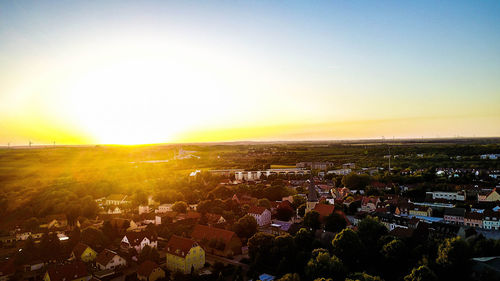 High angle view of townscape against sky during sunset