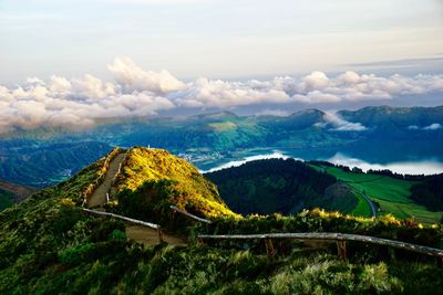 Scenic view of landscape and mountains against sky
