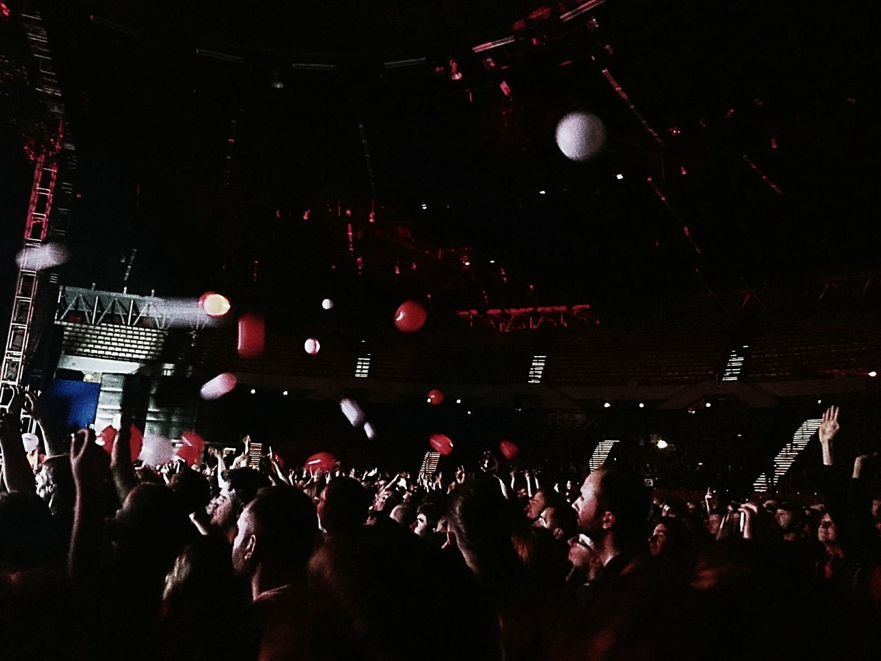 GROUP OF PEOPLE AT MUSIC CONCERT