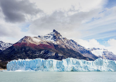 Scenic view of snowcapped mountain against sky