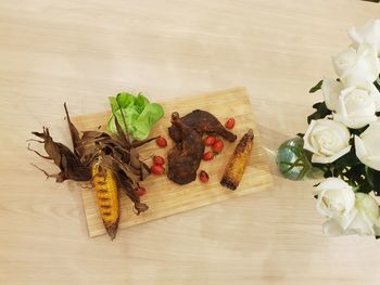 High angle view of roses on table