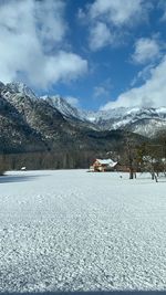 Scenic view of snowcapped mountains against sky in hallstatt austria 