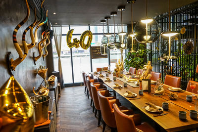 Row of wine bottles on table in restaurant