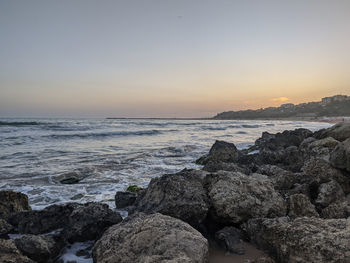 Scenic view of sea against sky during sunset