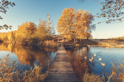 Scenic view of lake against sky during autumn