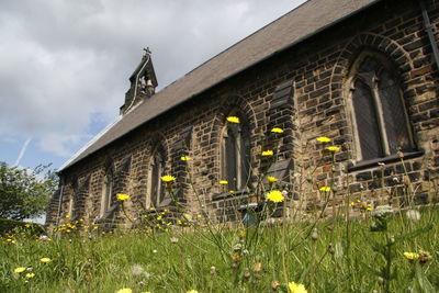 Low angle view of historic building against sky