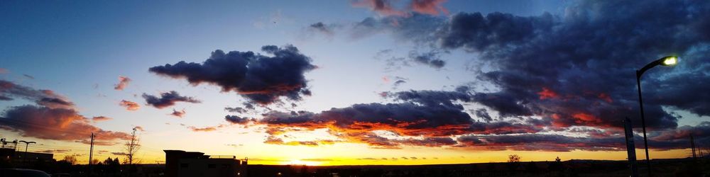 Low angle view of dramatic sky during sunset