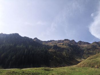 Landscape with mountain range in background