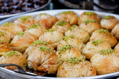 Traditional turkish desserts baklava at open buffet restaurant in hotel 