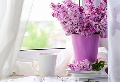 Midsection of woman holding bouquet