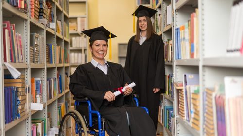 Portrait of woman wearing graduation