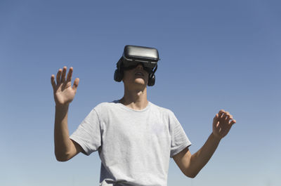 Virtual reality experience young man having a funny moment