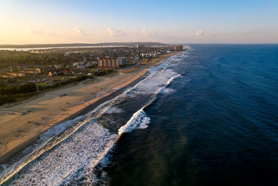 Aerial view of jersey shore against sky during sunset