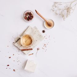 High angle view of tea cup against white background