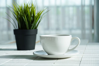 Close-up of coffee served on table