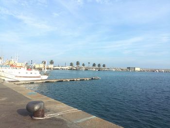 Boats moored in sea