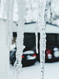 Close-up of icicles against blurred background