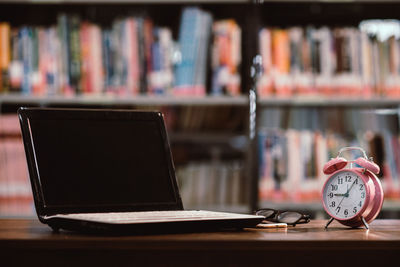 Close-up of laptop on table at home