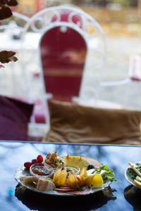 Close-up of fruits in plate on table