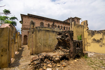 Old ruin building against sky