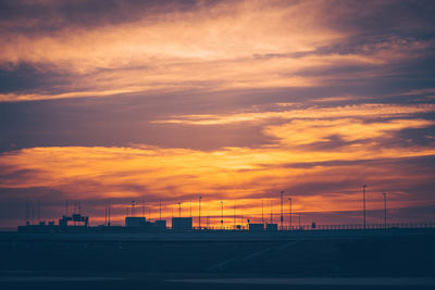 Scenic view of dramatic sky during sunset