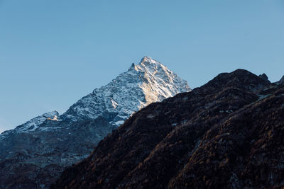 Scenic view of mountains against clear sky