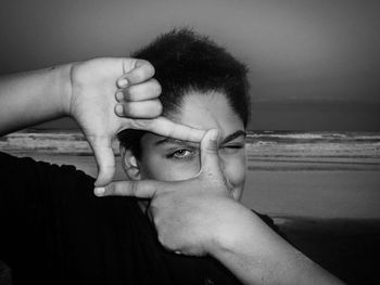 Woman standing on beach