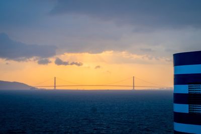 View of suspension bridge at sunset