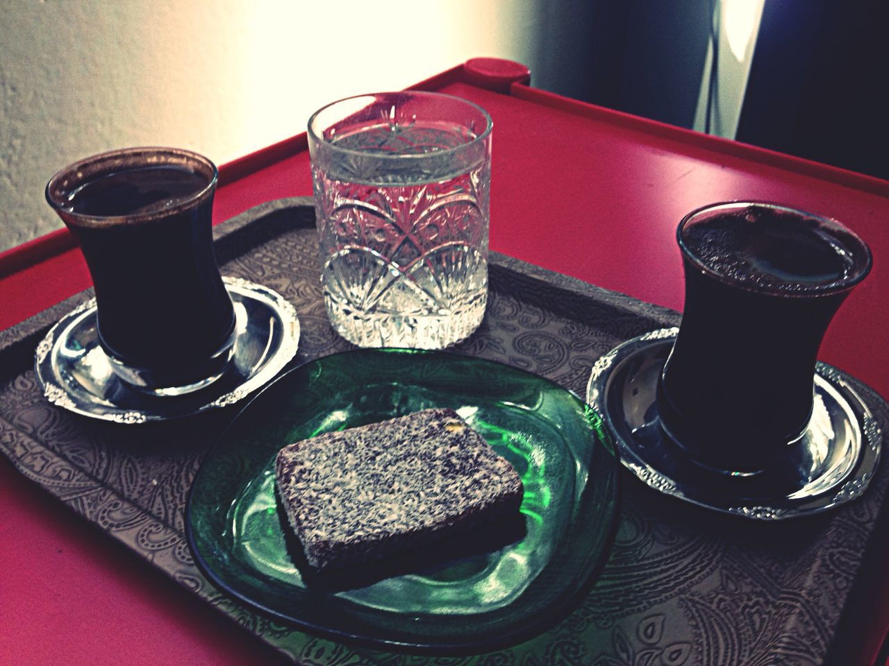 indoors, table, still life, drink, food and drink, close-up, refreshment, high angle view, freshness, glass - material, drinking glass, coffee cup, no people, cup, jar, bottle, container, red, glass, focus on foreground