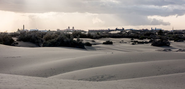 Panoramic view of desert against sky