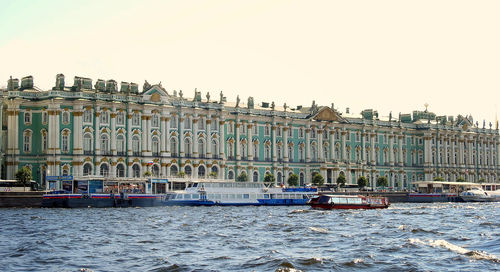 Panoramic view of buildings against clear sky
