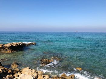 Scenic view of sea against clear sky