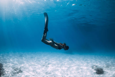 Man swimming in sea