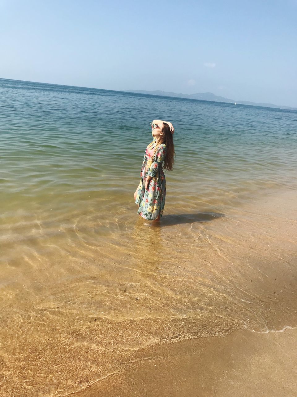 sea, beach, one person, young adult, water, horizon over water, young women, nature, scenics, sand, real people, standing, sky, beautiful woman, beauty in nature, outdoors, day, full length, one young woman only, people