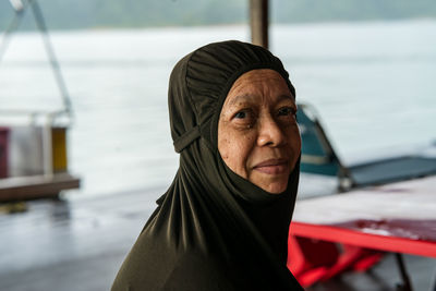 Portrait of mid adult man in boat