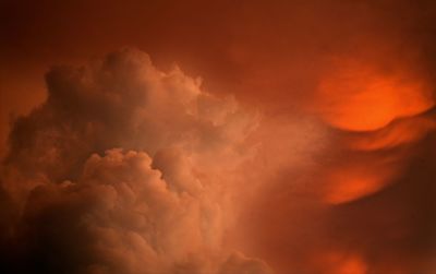 Scenic view of dramatic sky at sunset