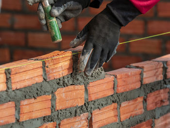 Man working on wall