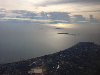 Scenic view of sea and buildings against sky